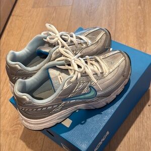 Nike Silver and Blue Athletic Shoes with Retro Design